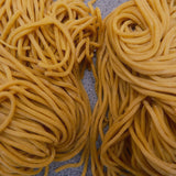 Close up of golden Sapporo style noodles